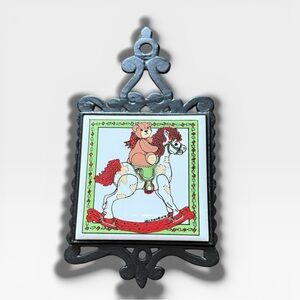 1978 Lucy Rigg Christmas Cast Iron Tile Trivet